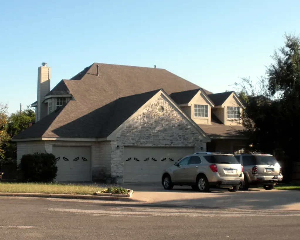 Custom home with stone exterior — Kibo Contractors LLC, Central Texas